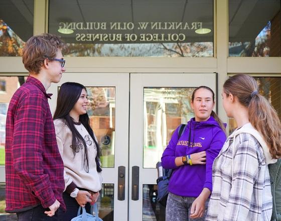 students outside of the Olin building